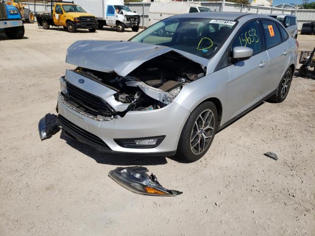 Photo 2 from auction – 2018 FORD FOCUS SE with VIN 1FADP3FE0JL230886