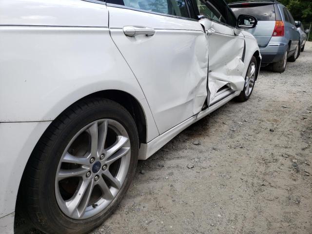 Photo 9 from auction – 2014 FORD FUSION SE with VIN 3FA6P0H77ER113352