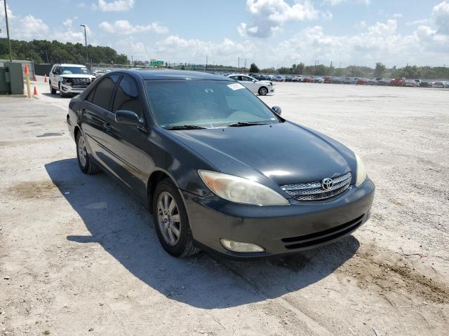 Photo 1 from auction – 2003 TOYOTA CAMRY LE with VIN 4T1BF30K03U551774