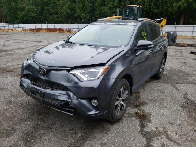 Photo 2 from auction – 2017 TOYOTA RAV4 XLE with VIN JTMRFREV7HD215832