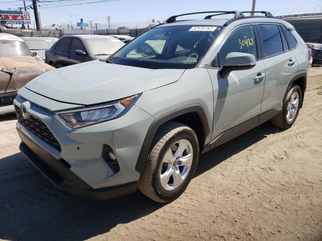 Photo 2 from auction – 2019 TOYOTA RAV4 XLE with VIN JTMW1RFV7KD029523
