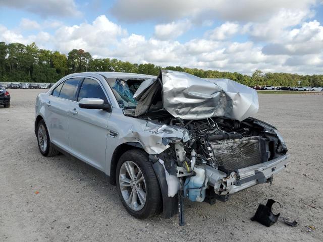 FORD TAURUS SEL 2013 with VIN 1FAHP2E87DG213653 - Photo from auction