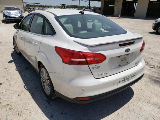 Photo 3 from auction – 2015 FORD FOCUS TITA with VIN 1FADP3J25FL210508