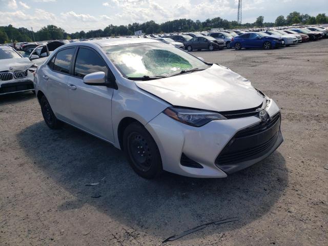 TOYOTA COROLLA L 2017 with VIN 5YFBURHE0HP634556 - Photo from auction