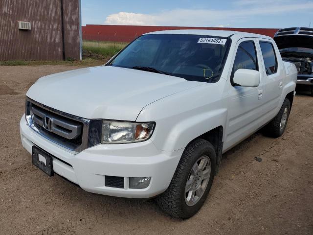 Photo 2 from auction – 2010 HONDA RIDGELINE with VIN 5FPYK1F42AB006714