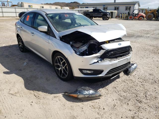 FORD FOCUS SE 2018 z numerem VIN 1FADP3FE0JL230886 - Zdjęcie z aukcji