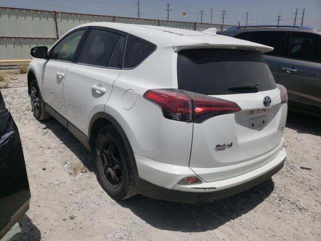 Photo 3 from auction – 2018 TOYOTA RAV4 LE with VIN JTMZFREV4JJ197989