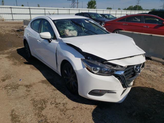 MAZDA 3 TOURING 2018 with VIN 3MZBN1L32JM270087 - Photo from auction