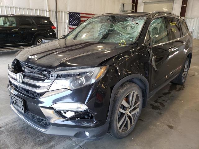 Photo 2 from auction – 2017 HONDA PILOT TOUR with VIN 5FNYF5H93HB013789