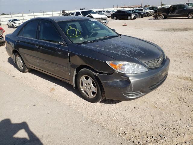 TOYOTA CAMRY LE 2002 with VIN 4T1BF32K02U512078 - Photo from auction
