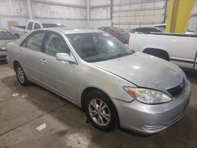 TOYOTA CAMRY LE 2004 with VIN 4T1BF30K44U584360 - Photo from auction