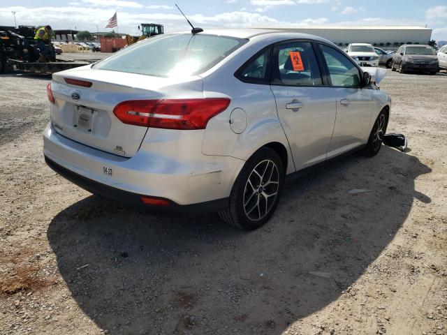 Photo 4 from auction – 2018 FORD FOCUS SE with VIN 1FADP3FE0JL230886