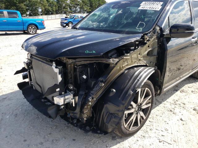 Photo 9 from auction – 2022 HONDA PILOT TOUR with VIN 5FNYF5H93NB014114