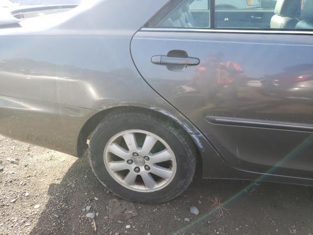 Photo 9 from auction – 2004 TOYOTA CAMRY LE with VIN 4T1BF30K04U583027