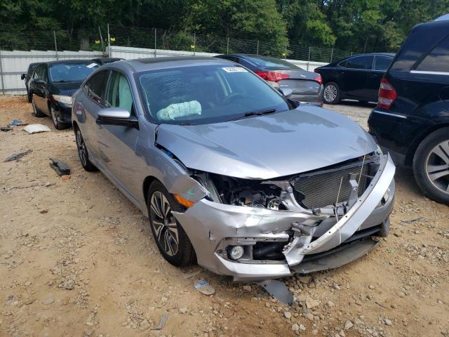 HONDA CIVIC EX 2017 with VIN 19XFC1F3XHE009123 - Photo from auction