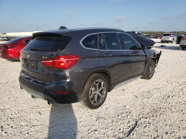 Photo 4 from auction – 2017 BMW X1 XDRIVE2 with VIN WBXHT3C32H5F83094