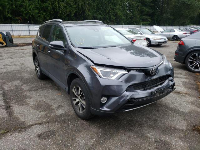 TOYOTA RAV4 XLE 2017 with VIN JTMRFREV7HD215832 - Photo from auction