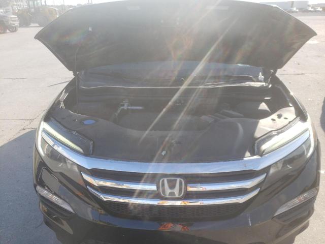 Photo 7 from auction – 2017 HONDA PILOT TOUR with VIN 5FNYF5H92HB042572