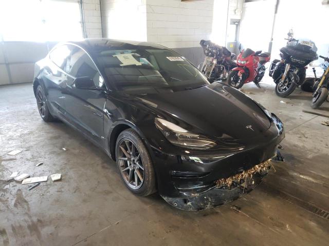 TESLA MODEL 3 2021 with VIN 5YJ3E1EBXMF031438 - Photo from auction