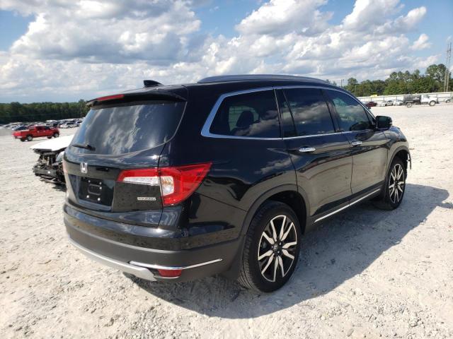 Photo 4 from auction – 2022 HONDA PILOT TOUR with VIN 5FNYF5H93NB014114