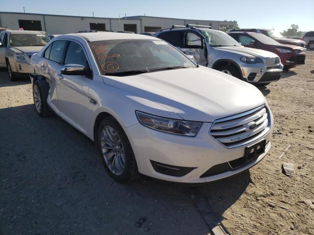 FORD TAURUS LIM 2014 with VIN 1FAHP2F86EG128013 - Photo from auction