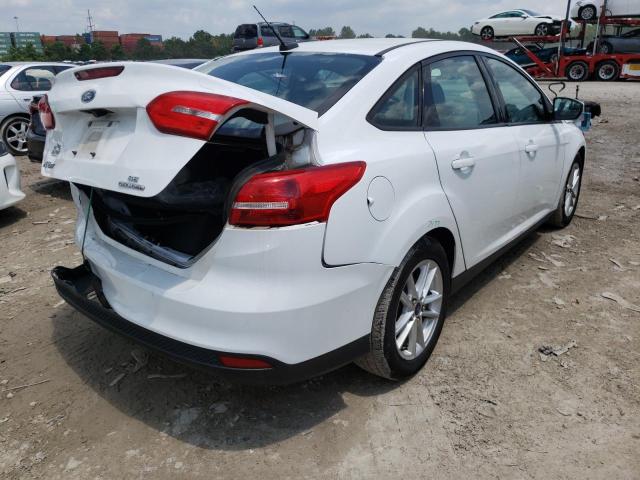 Photo 4 from auction – 2016 FORD FOCUS SE with VIN 1FADP3F20GL259027
