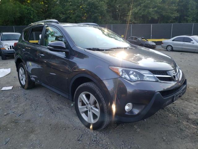 TOYOTA RAV4 XLE 2014 with VIN 2T3WFREV9EW087398 - Photo from auction