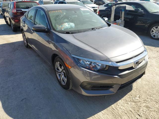 HONDA CIVIC LX 2018 with VIN 19XFC2F52JE203349 - Photo from auction