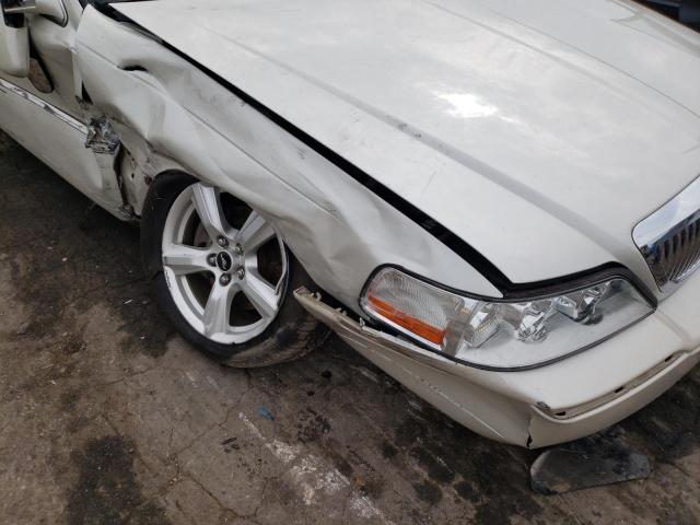 Photo 9 from auction – 2004 LINCOLN TOWN CAR U with VIN 1LNHM83W44Y647266