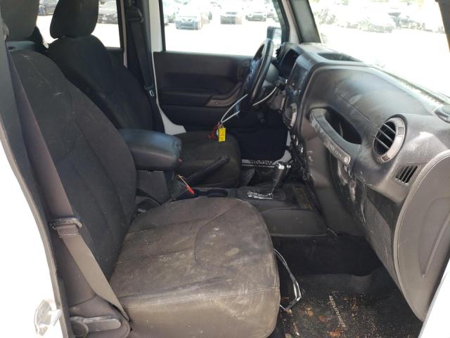 Photo 5 from auction – 2015 JEEP WRANGLER U with VIN 1C4BJWDG9FL526246
