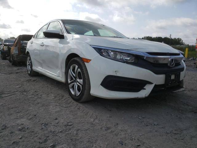 HONDA CIVIC LX 2018 with VIN 19XFC2F54JE035360 - Photo from auction