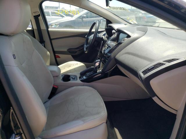 Photo 5 from auction – 2014 FORD FOCUS with VIN 1FADP3R48EL305858