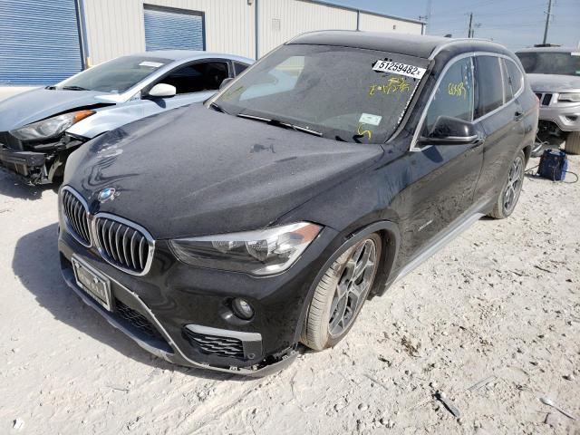 Photo 2 from auction – 2016 BMW X1 XDRIVE2 with VIN WBXHT3C37G5E47235