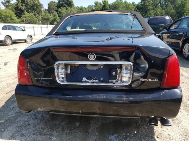 Photo 9 from auction – 2002 CADILLAC DEVILLE with VIN 1G6KD54Y52U289725