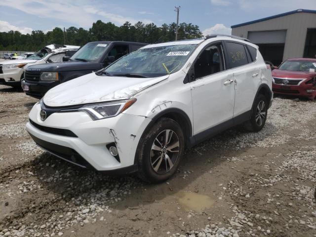 Photo 2 from auction – 2017 TOYOTA RAV4 XLE with VIN JTMWFREV3HD102608