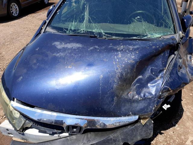 Photo 7 from auction – 2010 HONDA CIVIC LX with VIN 19XFA1F58AE027035