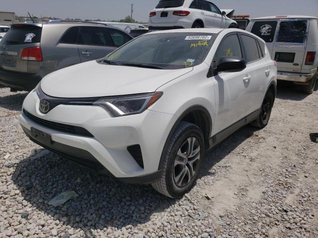 Photo 2 from auction – 2018 TOYOTA RAV4 LE with VIN JTMZFREV4JJ197989