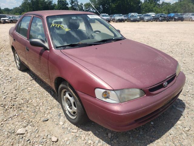 TOYOTA COROLLA VE 2000 with VIN 1NXBR12E5YZ411228 - Photo from auction
