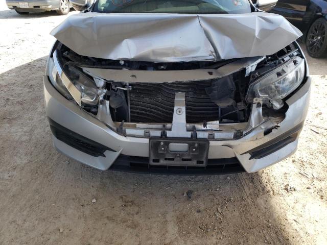 Photo 9 from auction – 2018 HONDA CIVIC LX with VIN 19XFC2F5XJE009684