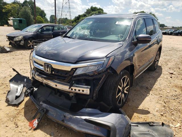 Photo 2 from auction – 2019 HONDA PILOT TOUR with VIN 5FNYF5H95KB020928