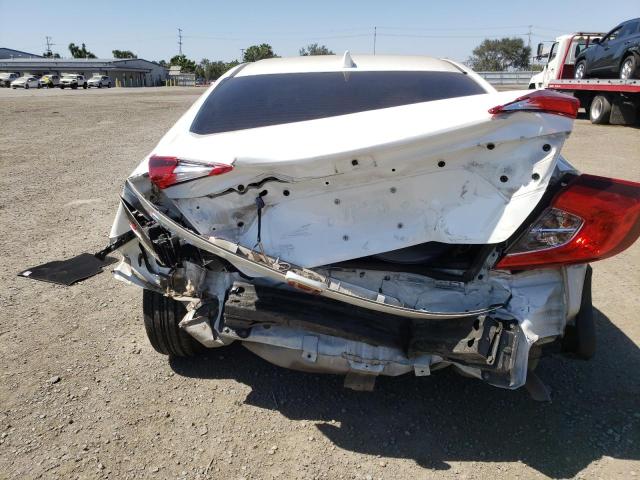 Photo 9 from auction – 2018 HONDA CIVIC EX with VIN 19XFC2F79JE205424