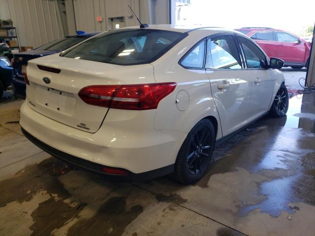 Photo 4 from auction – 2015 FORD FOCUS SE with VIN 1FADP3F27FL373170