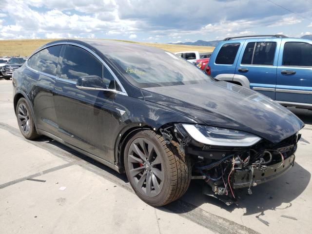 TESLA MODEL X 2018 with VIN 5YJXCBE45JF140917 - Photo from auction