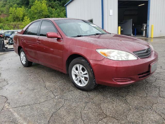 TOYOTA CAMRY LE 2004 with VIN 4T1BF32KX4U064337 - Photo from auction