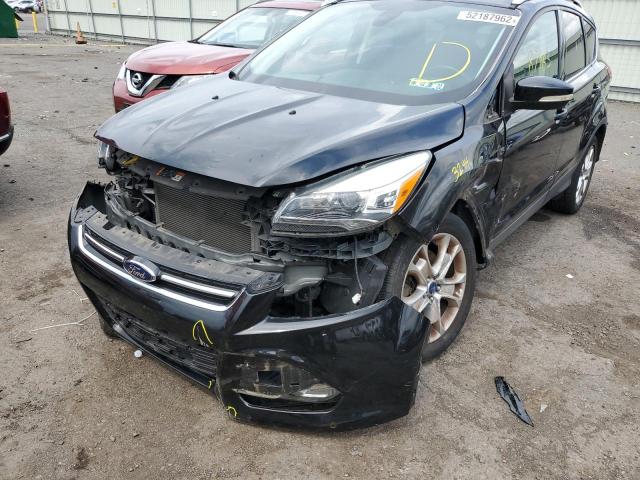 Photo 9 from auction – 2015 FORD ESCAPE TIT with VIN 1FMCU9JX7FUA65975