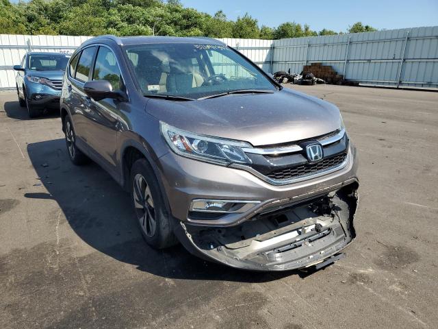 Photo 9 from auction – 2015 HONDA CR-V TOURI with VIN 5J6RM4H97FL040499