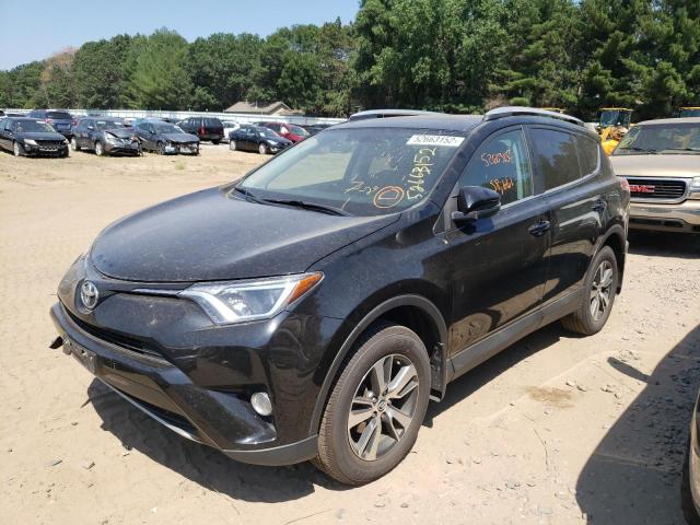 Photo 2 from auction – 2016 TOYOTA RAV4 XLE with VIN 2T3RFREV4GW528791