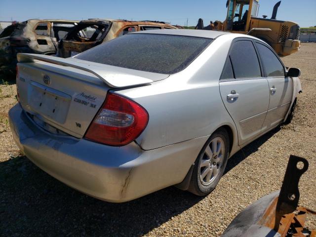 Photo 4 from auction – 2002 TOYOTA CAMRY LE with VIN JTDBF30K620013459