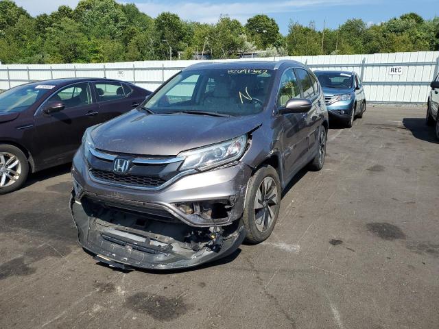 Photo 2 from auction – 2015 HONDA CR-V TOURI with VIN 5J6RM4H97FL040499