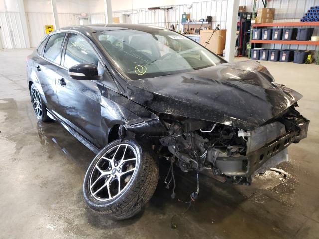 FORD FOCUS SE 2016 with VIN 1FADP3F20GL203699 - Photo from auction
